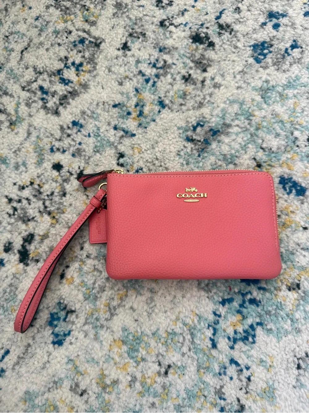 COACH Pebbled Leather Wristlet in Rose Pink with Gold Logo